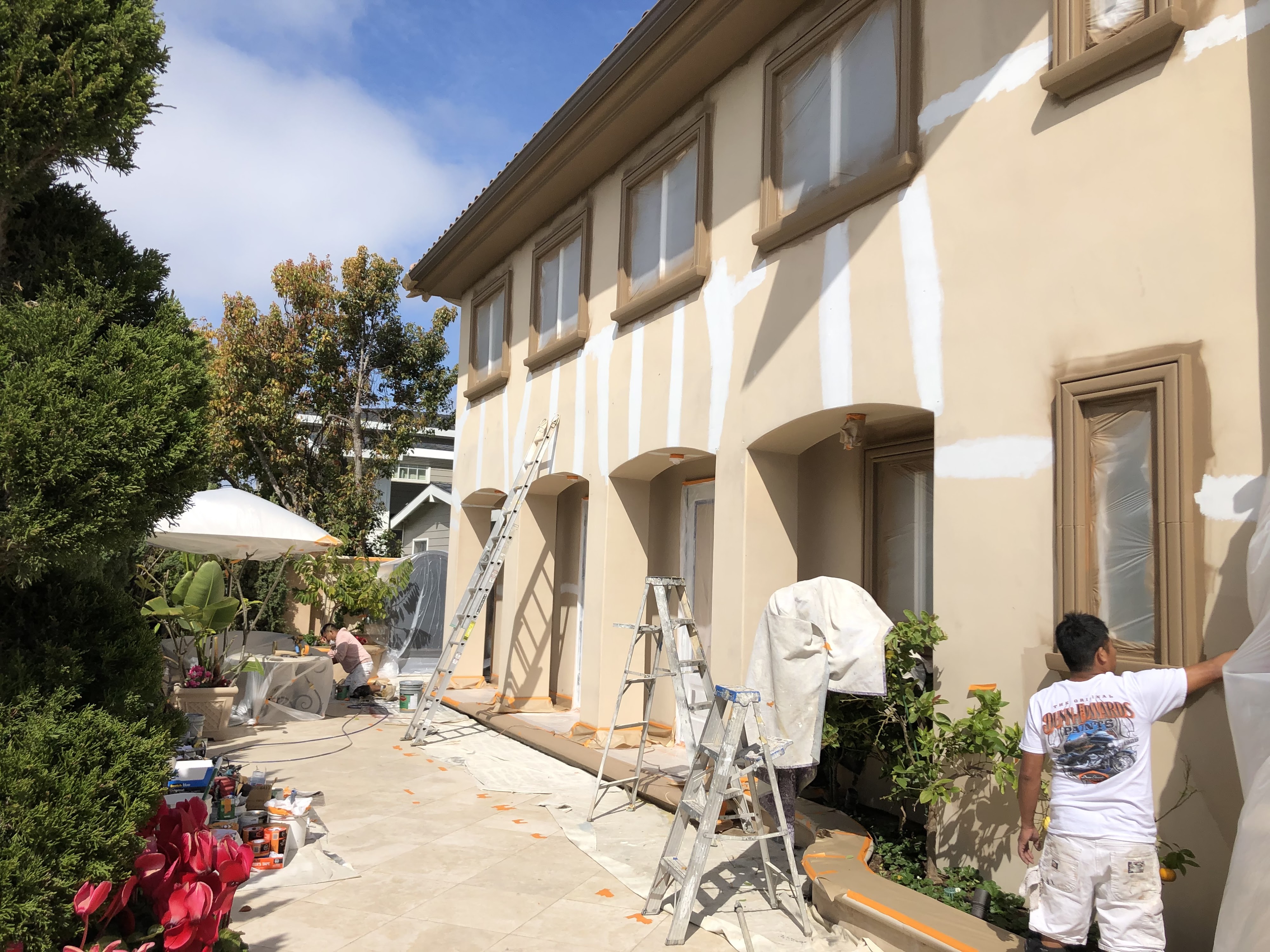Two-story Coachella Valley stucco home freshly painted by Bartley Corrigan
